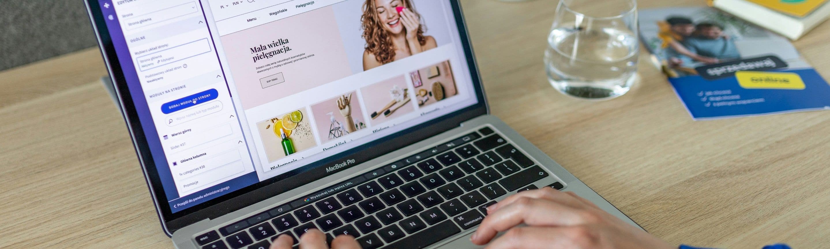 Hands typing on a laptop open on an online beauty shop