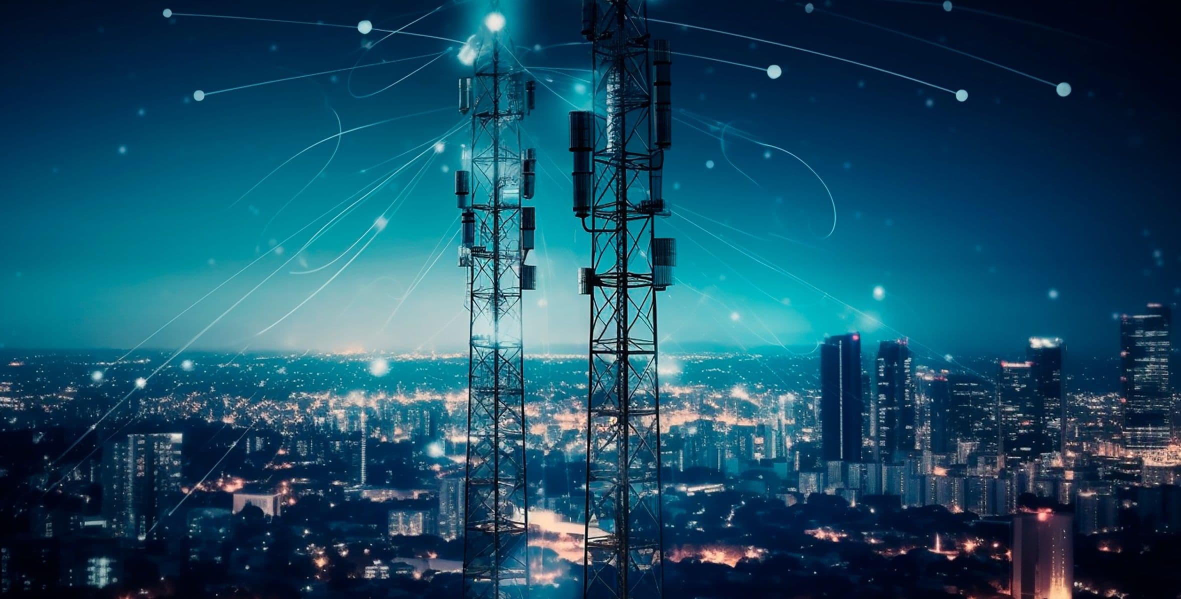 Two telecom towers against a city skyline at night, linked by points of light
