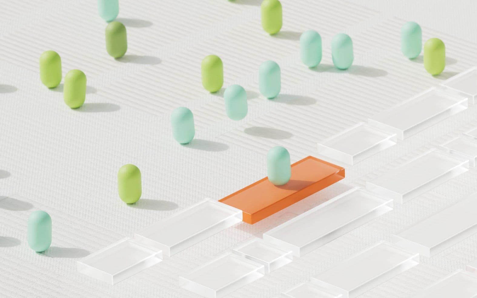 Capsules scattered across glass tiles